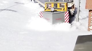 snow cleaning by night on railway