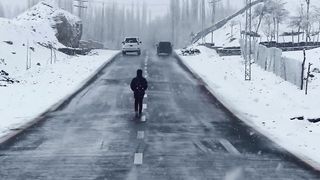 "Snowy Serenity: Exploring the Enchanting Roads of Gilgit-Baltistan"