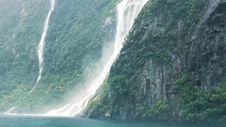 "Serenity Unveiled: Exploring the Majestic Mountains and Flowing Waters of New Zealand"