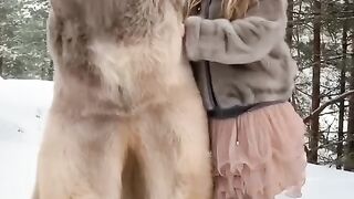 The friendship and love between the girl and the bear