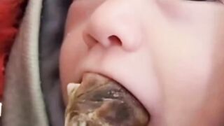 The baby a displaced mother put dates in here babys mouth ????????