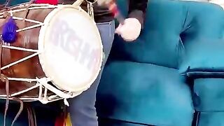 Arishma playing Dhol
