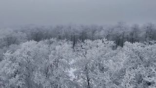 Grooming snowmobile trails