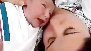 Baby meets mom for the first time!