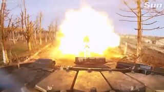 Russian armoured combat tanks blast Ukrainian military positions