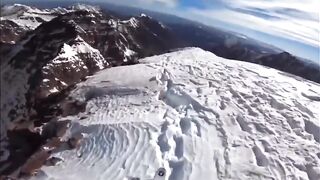 Skier snags a rock trying to ski down a 1000 ft slope in Aspen, CO