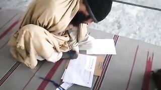 The student is solving paper with foot.# #deen #wafaqulmadaris #eman