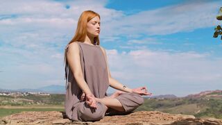 Woman meditating in nature