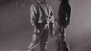 Kanye West hugging playboi carti