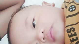 Baby laughs