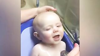 Cute baby in bathtime