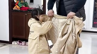 Her father researched a new way to put on clothes. He said it saves trouble and keeps you warm