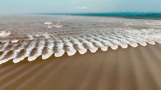 Fish Scale Tide – A Natural Phenomenon Unique to Qiantang River