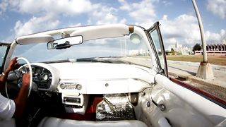 Driving a classic convertible car