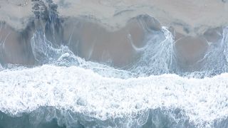 Waves crash on the shore