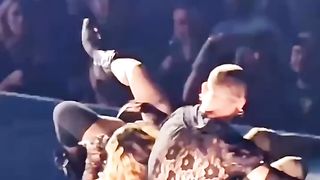 Feil with singer Madonna at a concert