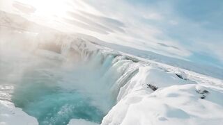 This frozen waterfall asked for it.......
