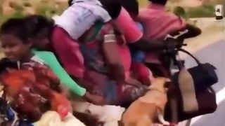 Family group on one motorbike