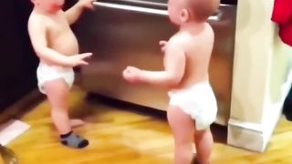 Funny Twins baby talking #shorts #shortsfeed #cute #baby #trending #cutebaby #twins #funnybaby