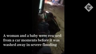 Brazil storms: Baby rescued from car moments before it's washed away