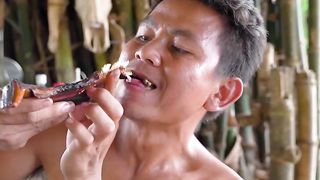 Grilled Snake eating in jungle