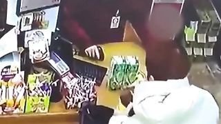 The saleswoman fell asleep right behind the cash register