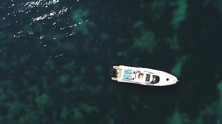 "Yacht Serenity: Luxury Sailing Amidst Peaceful Seas"