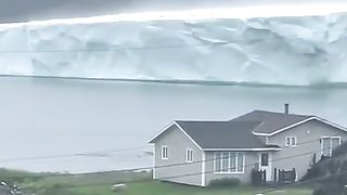 A huge iceberg near the island of Newfoundland in Canada