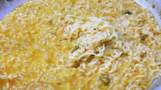Chinese noodle finished cooking at the table!