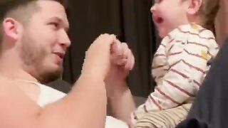 Funny child and father