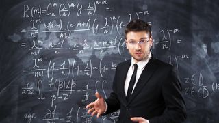Young teacher teaching complicated equations