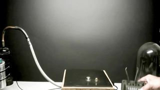 HV voltaic arc in vacuum chamber Test