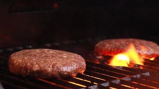 ground steak on the barbecue grill