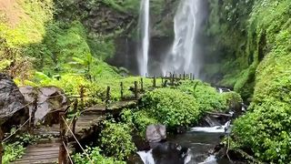 the most beautiful view of the twin waterfalls of Sukabumi's ancient valley