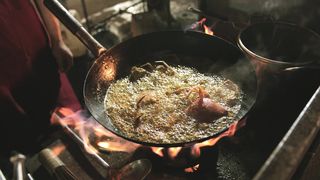 Deep Frying A Crab On A Wok In High Fire