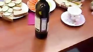 Opening a bottle of wine without a corkscrew