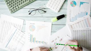 Business people analyzing marketing data