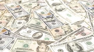 Dollar bills covering the entire shot