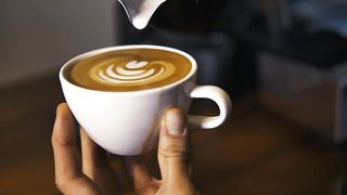 Serving a sparkling cappuccino in a cup
