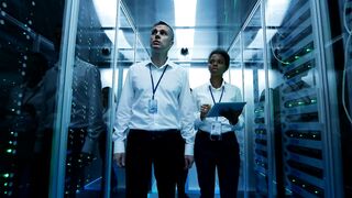 Engineers working in the data center