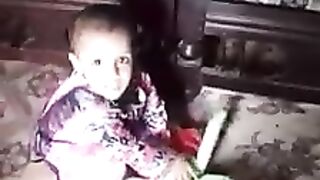 CUTE BABY GIRL PLAYING WITH DOLL