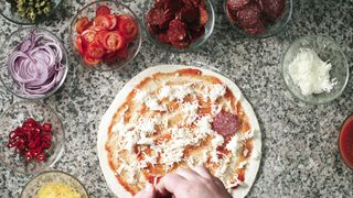 "Cracking the Pizza Code: Expert Tips and Delicious Recipes"