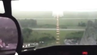 Runway disappears in rainstorm right as the plane is about to land