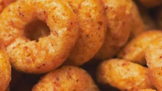Cinnamon oat rings cereal, slowly rotating