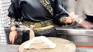 The girl cutting vegetable