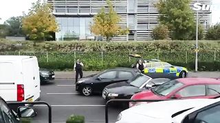 Dramatic moment UK armed cops swoop in on Audi in North London.