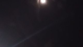"Gazing at the Moon's Splendor: Nighttime Beauty Unveiled"