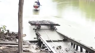 Small boat bridge over land