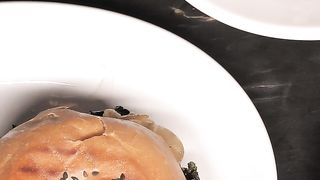 Burgers on plates on a table