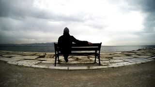 Peaceful man looking out to sea